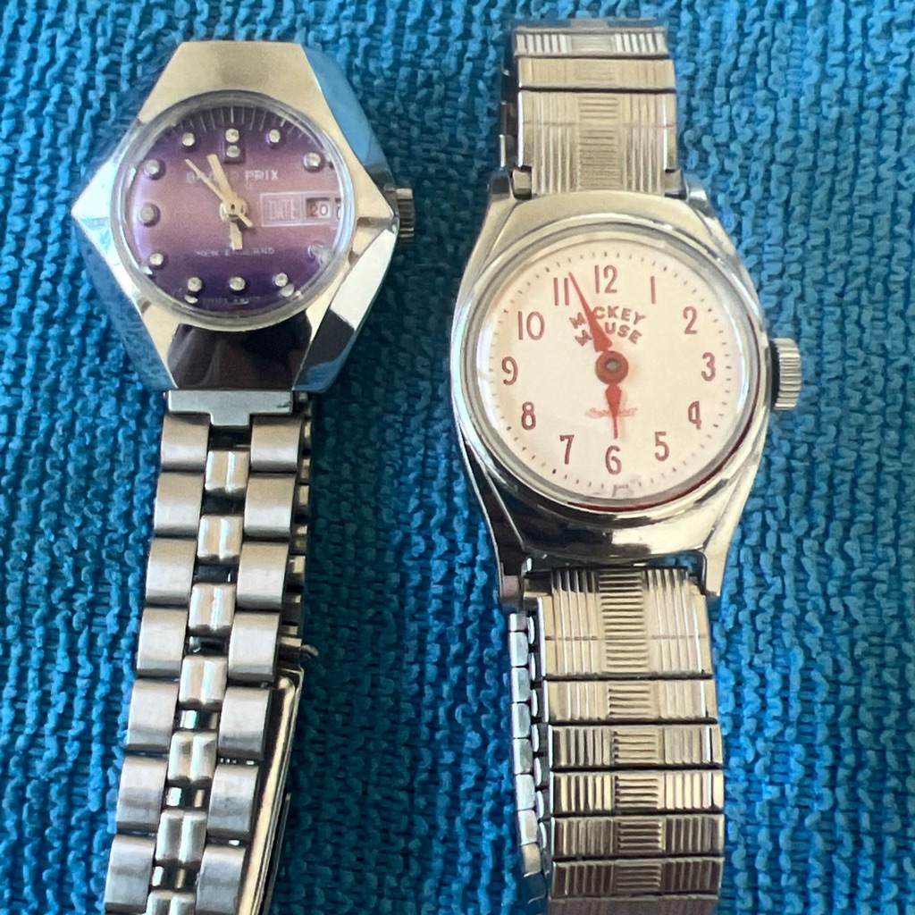 Lot Of 2 Silver Watches With Purple And White Dials Elegant Watches Valued 500 Lot Of 2 Silver Watches With Purple And White Dials Elegant Watches Valued 500